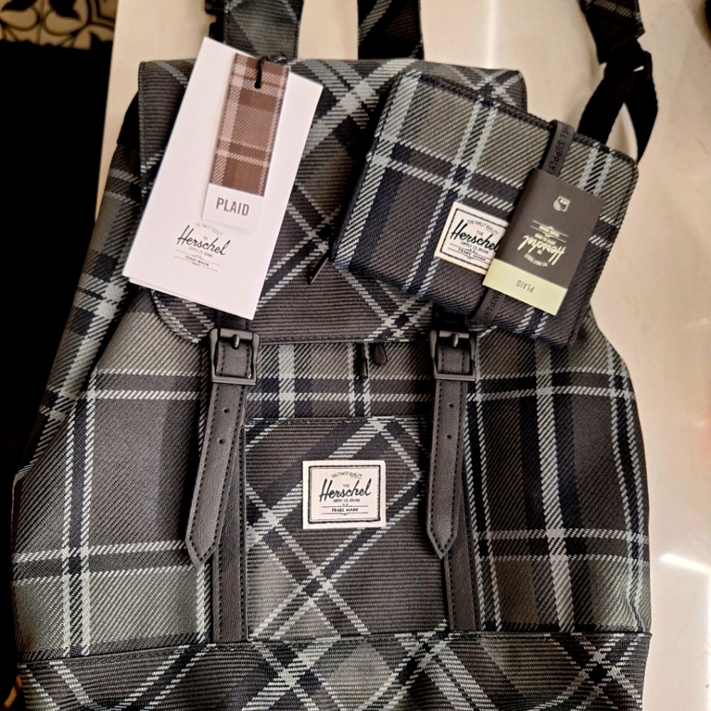 Herschel retreat mini backpack and zip around wallet.  Brand new!